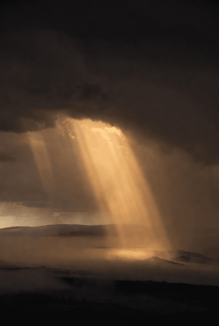 Rays of golden light breaking through dark storm clouds over a misty landscape, symbolizing hope and beauty emerging through vulnerability