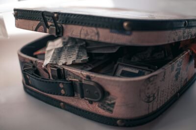 A suitcase symbolizing the emotional journey we all carry—filled with memories, dreams, hopes, and the silent weight of longing.